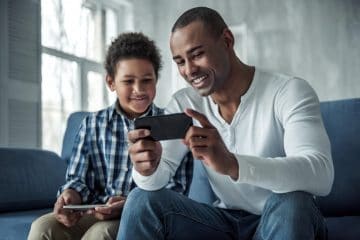 Father and son on phone