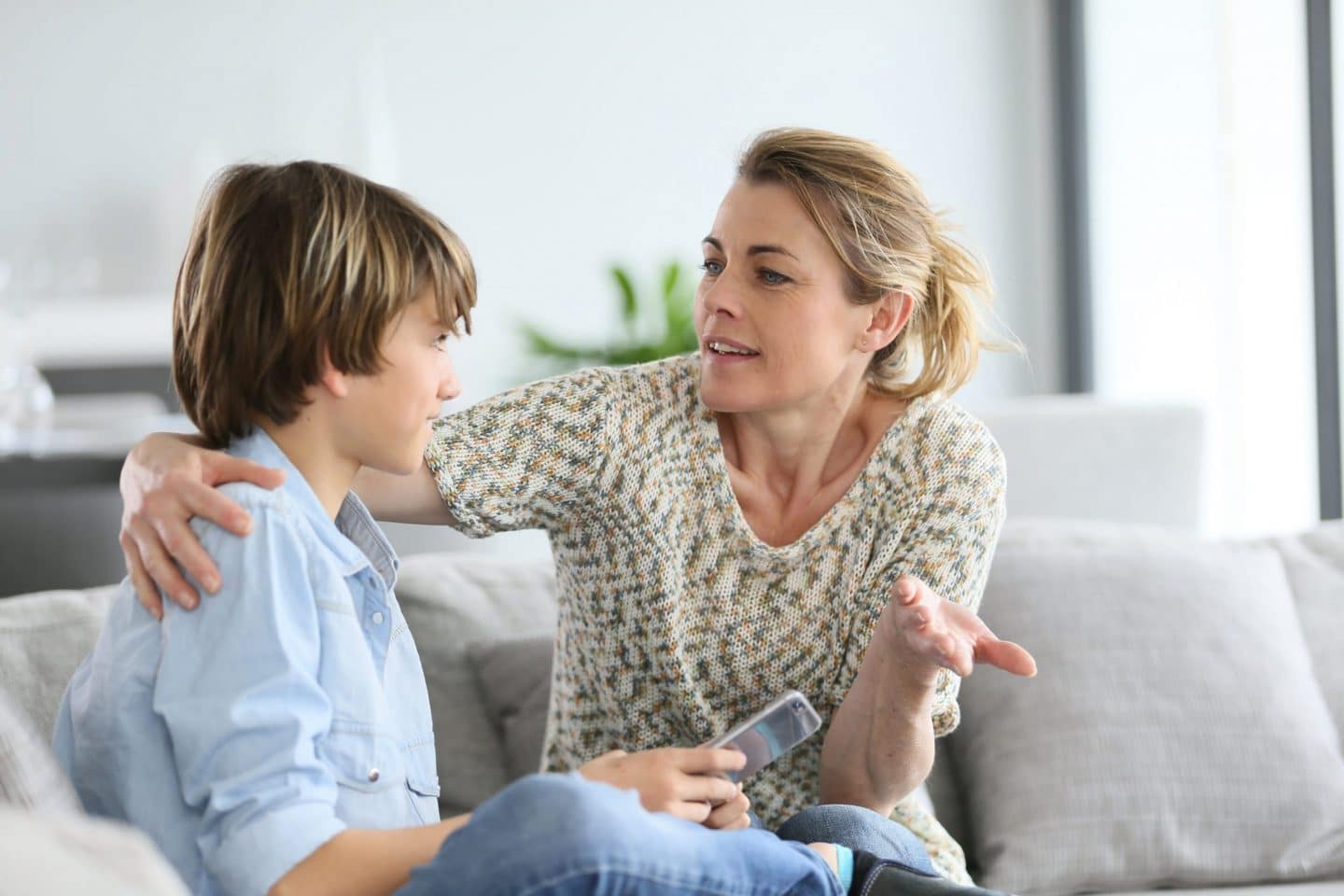 Mother talking to son