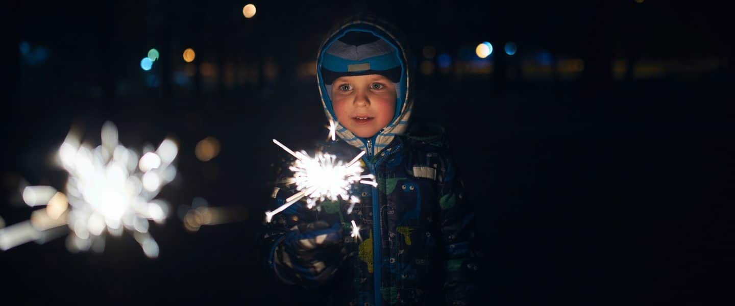 new years activity for kids child with sparkler