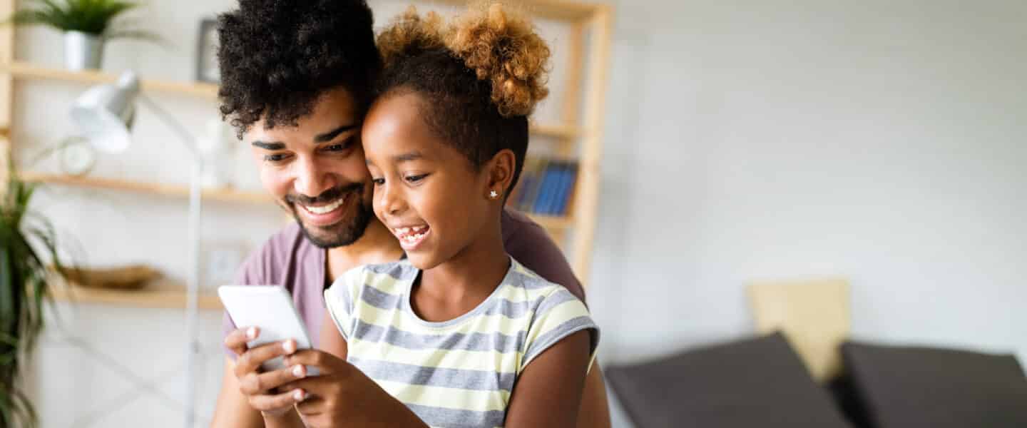 father and daughter on phone