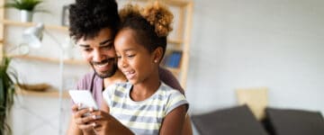 father and daughter on phone