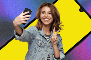 Girl doing a peace sign at a phone while taking a selfie