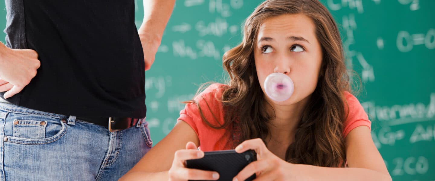 distracted teen girl at school