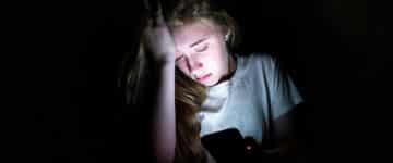 sad girl being groomed online
