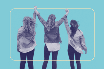 3 girls raising their arms victoriously