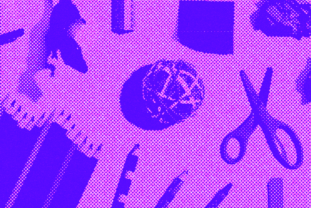 Purple hued image of carious crafts supplies.