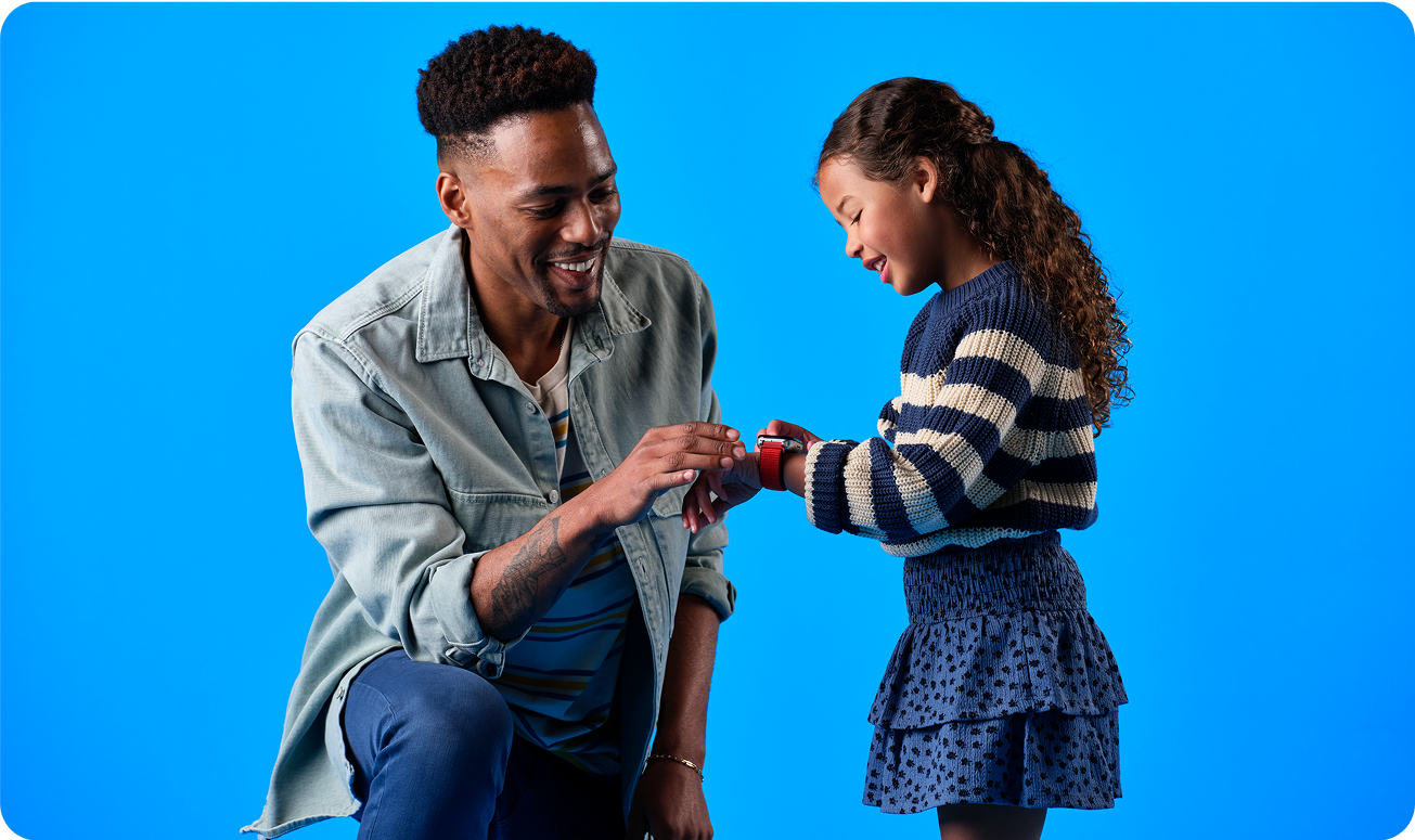 A parent assisting their child with their gabb watch features