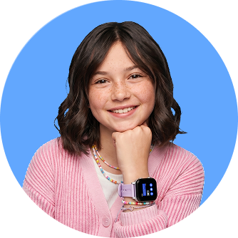a young girl smiling, wearing a Gabb Watch on her wrist