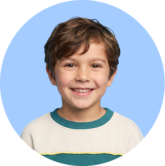 a young boy smiling